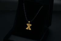 حرف ذهب X عيار 21 (P2316)