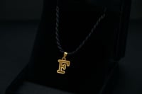 حرف ذهب F عيار 21 (P2298)