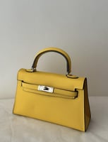 شنطة بيوند 22 كيلي ستايل مع ستراب - اصفر