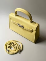 شنطة بيوند 22 كيلي ستايل مع ستراب - اصفر فاتح Butt...