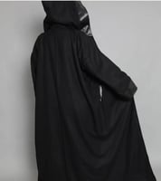 فروه اسود نسائي مع جلد أكمام