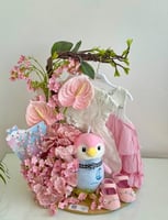 ‏تنسيق مواليد ورد صناعي