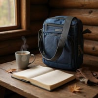 شنطة كتف مصنوعة من القماش بتصميم طولي