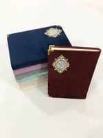 مصحف بغلاف مخمل