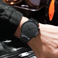 نيبوسي - ساعة يد رجالي تناظرية بعقارب ومينا أسود