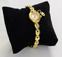 ساعة بناتي ذهبي ميناء وردي