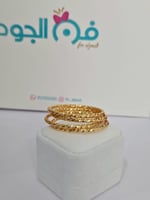 أسورة مطلية بالذهب بتصميم عصري