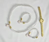 طقم بنات انيق ساعه مع سلسال واسوره وخلخال