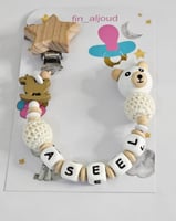 تعليقة مصاصه خشب وسيليكون