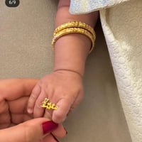 خاتم أطفال بالإسم مطلي ذهب اوفضه