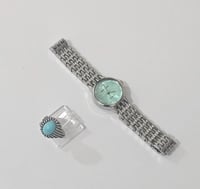 ساعة أولاد أنيقة فاخرة مع خاتم بحجر فيروزي أنيق