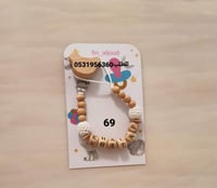 تعليقة مصاصه من الخشب والكروشية الفاخر