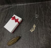 تعليقة العود للسياره