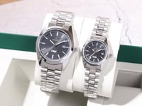 طقم ساعتين رجالية ونسائية بتصميم عصري وأنيق