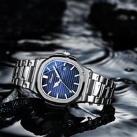 ساعة نسائية شبيهة باتيك فيليب بلون فضي ميناء كحلي