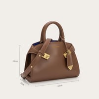 شنطة بلون بني بحجم متوسط لكل يوم