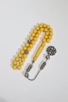 مسباح بكلايت اصفر مع فواصل