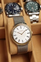 ساعة رجالية بسوار ستانلس ستيل بلون فضي ذهبي