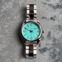 ساعة رجالية شبيهة رولكس باللون الفضي ميناء تيفاني