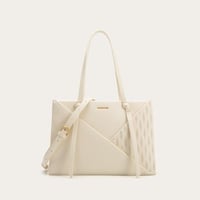 شنطة نسائية بمقاس كبير باللون البيج