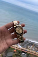 ساعة رجالية باللون الذهبي الكامل