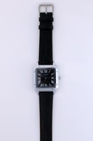 ساعة رجالية جلد اسود شبيهة كارتير