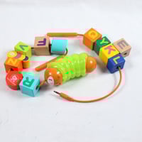 دودة لضم الخرز الموسيقية