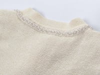 فستان قصير بتفاصيل فيونكة محبوكة من سيلف بورتريه