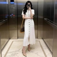 فستان ساندرو الماكسي المحبوك باللون الابيض