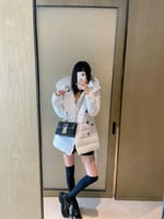 جاكيت BUR من بربري مستوحى من ريش الإوز الأبيض