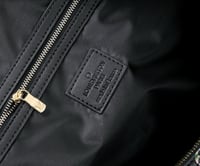 شنطه سفر من لويس فيتون