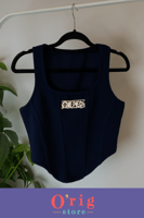 توب نسائي بشعار ون بيس