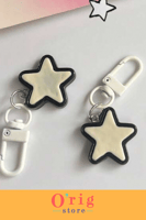 سلسلة مفاتيح بتصميم نجمة بيضاء (قطعة واحدة)