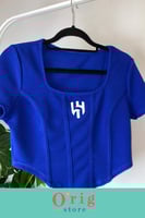 توب نسائي نص كم بشعار نادي الهلال