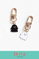 سلاسل مفاتيح بتصميم شبح (أبيض و أسود)