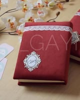 مصحف مغلف بالاسم