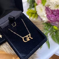 سلس حرفين مطلي ذهب عيار 21