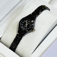 ساعة مواليد اسود مينا اسود او ابيض