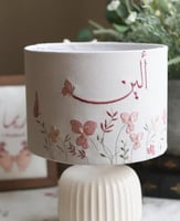 أبجورة مع تطريز أسم ورسمة