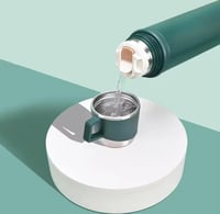 مطارة او زمزمية حافظه للحرارة مع كوب خارجي