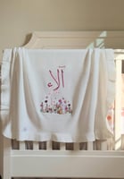 بانر مع فيونكات شامل التطريز