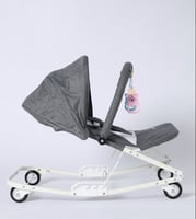 كرسي هزاز قماشي للرضع مع العاب معلقة وعجلات دوارة