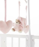 لعبة المهد الموسيقية على شكل دب - وردي