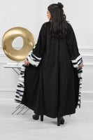 فروة شتوية طويلة أنيقة مبطنة بالفرو من الداخل وعلى...