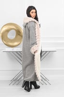 فروة شتوية طويلة مبطنة بالفرو من الداخل مزودة بفرو...