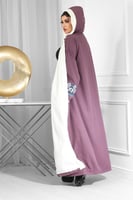 فروة شتوية مع تطريز الأكمام