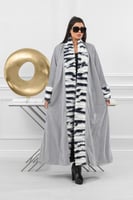 فروة شتوية طويلة أنيقة مبطنة بالفرو من الداخل وعلى...