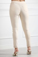 بنطال جينز خصر عالِ مطاطي بقصة ضيقة حتى الكاحل