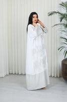 جلابية قماش بطول يصل للكاحل بنهايات أكمام واسعة وي...