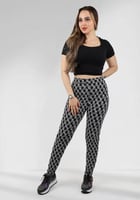 بنطال قطني سكيني بخصر مطاطي ومزين بنقشة بشكل حرف B